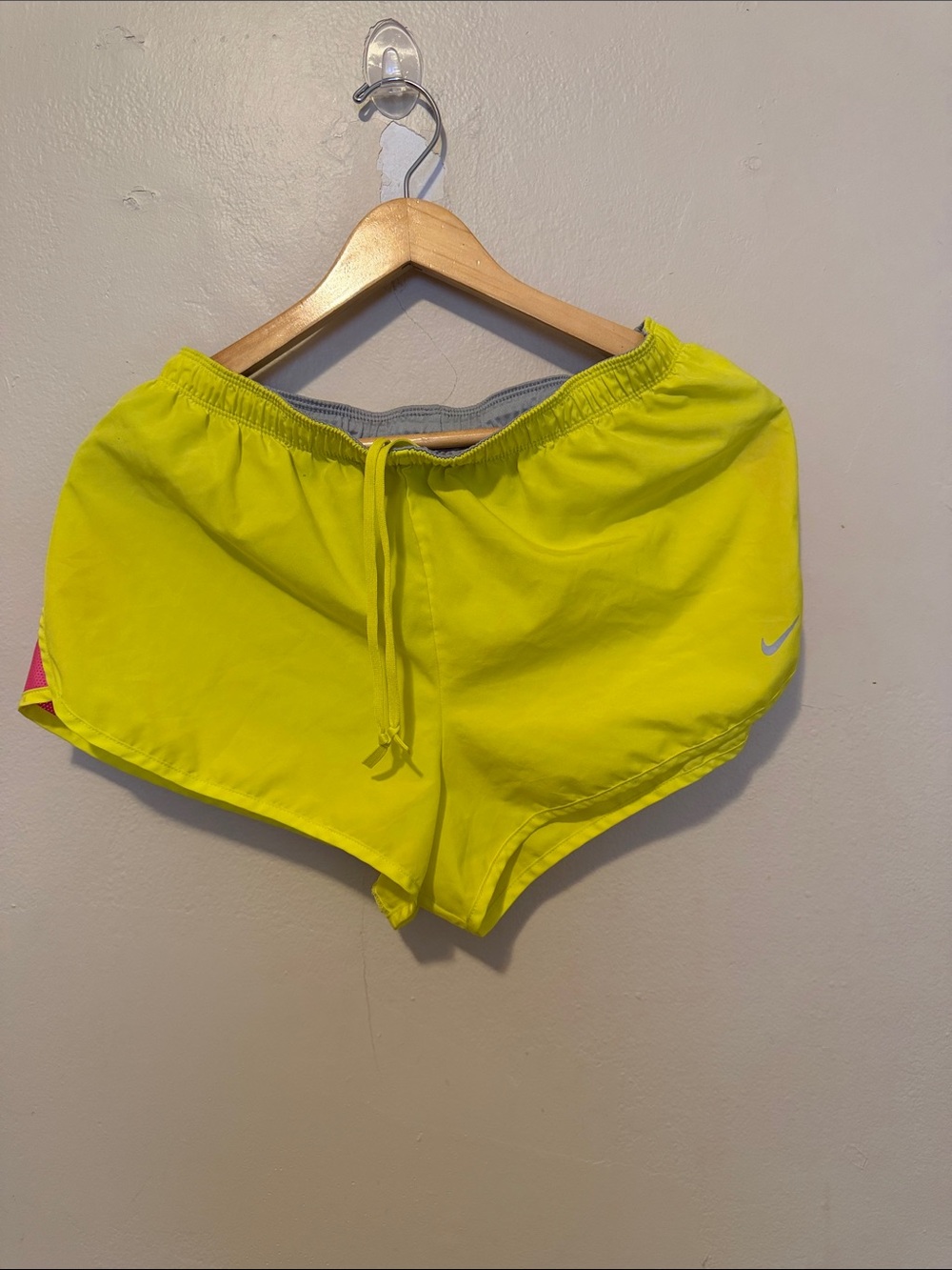 Nike Women's Neon Yellow Athletic Shorts with Pink Accent